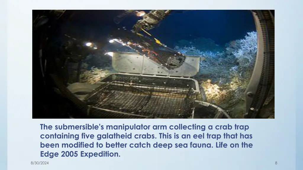 the submersible s manipulator arm collecting